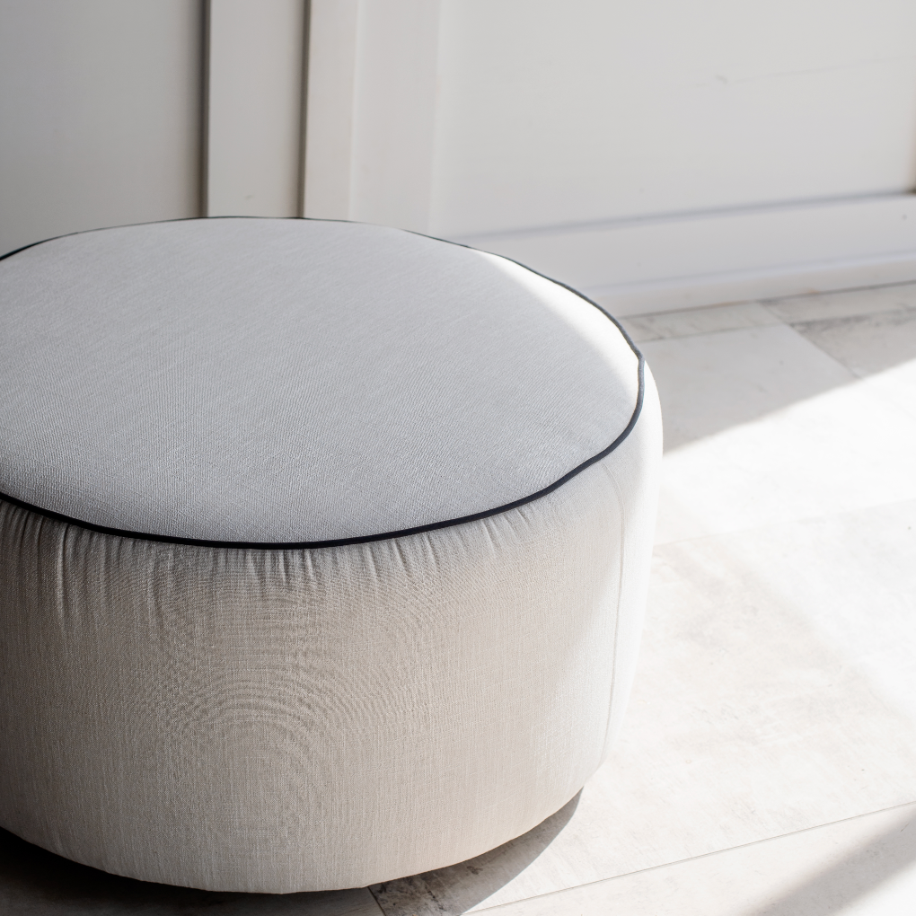 Round Ottoman with Piping