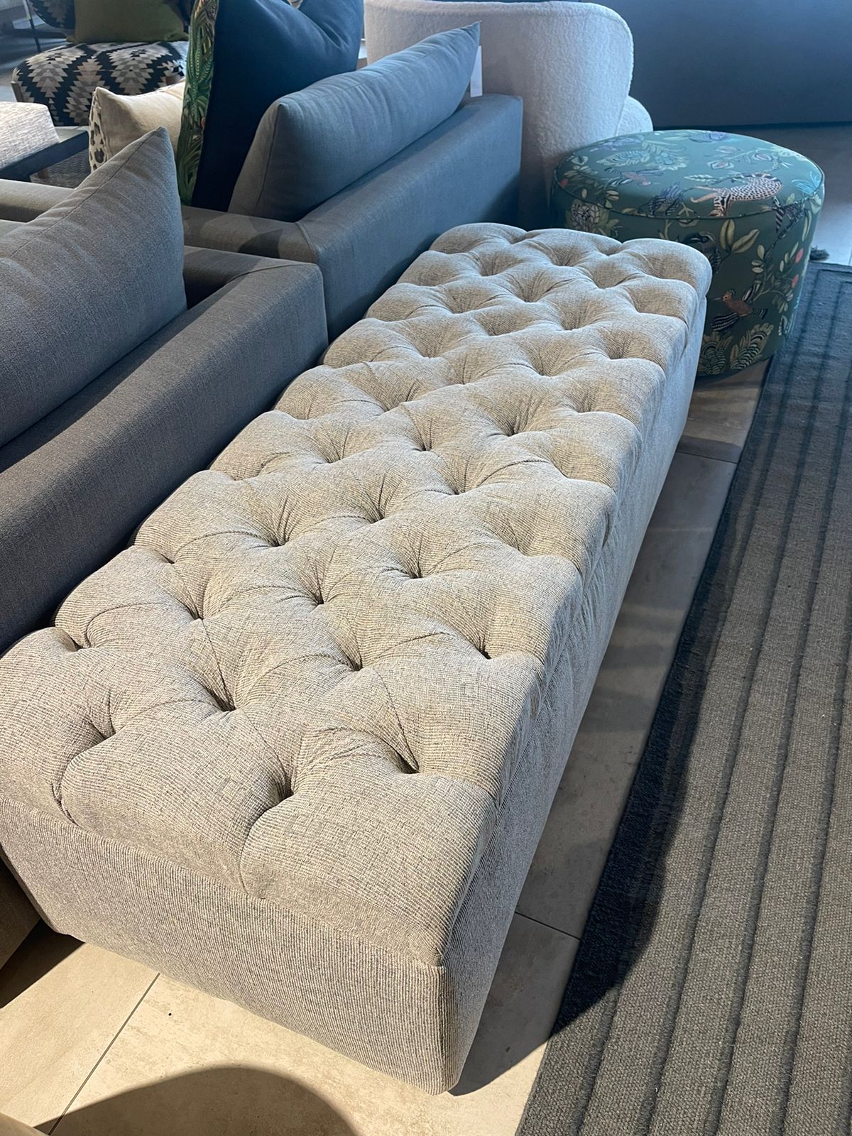 Deep buttoned storage ottoman