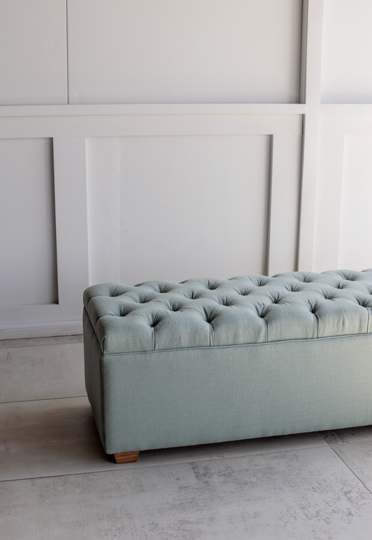 Deep buttoned storage ottoman